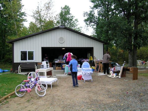 Shoppers hunt for bargains at a garage sale